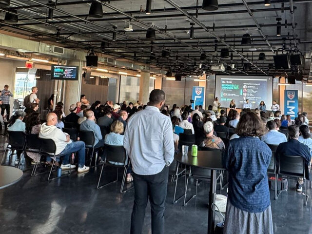 A packed 1752vc Responsible AI Symposium session at LMU