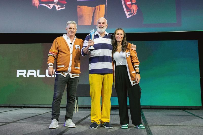A portfolio founder accepting an industry award