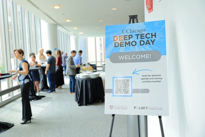 UChicago Deep Tech Demo Day welcome sign and attendees