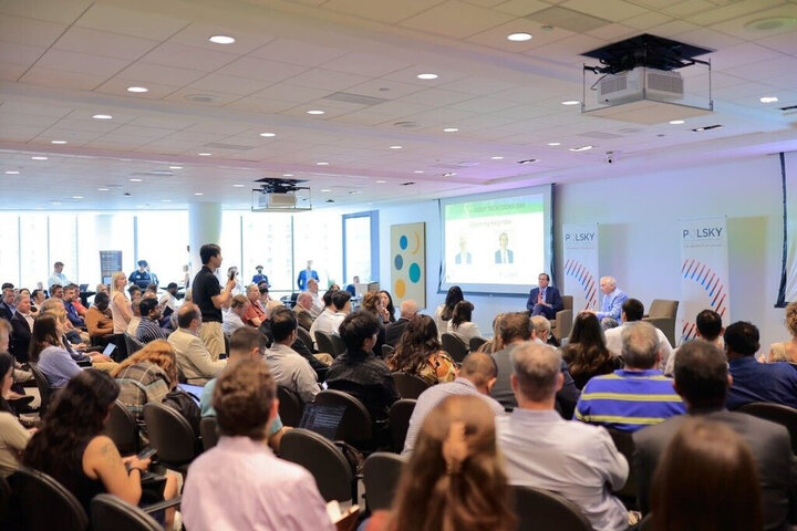 Audience at a demo day opening keynote