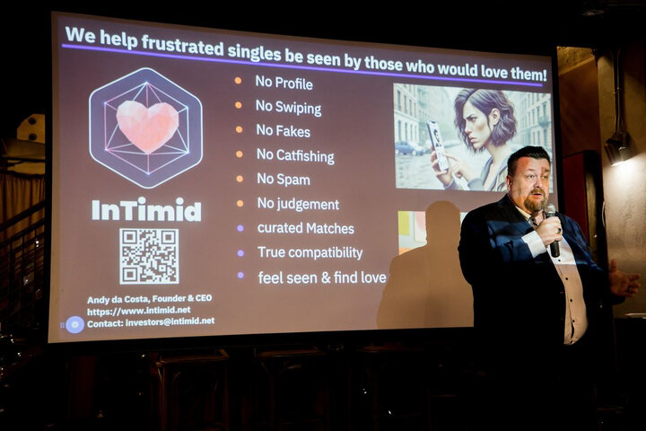 A founder pitching on stage at an event