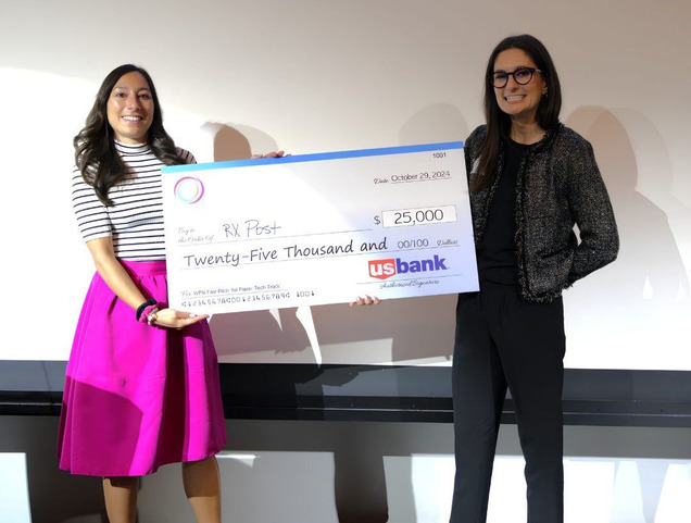 A portfolio founder receiving a $25,000 pitch award