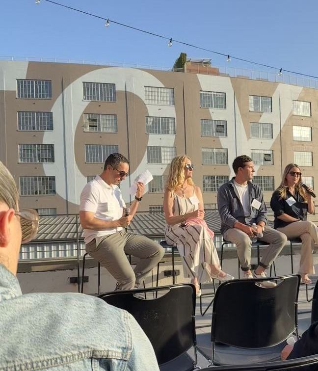 An investor conversation on a rooftop