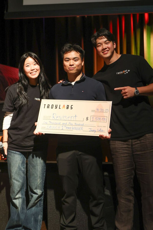 A first-place team on stage