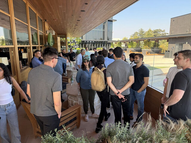 Founders and mentors at a founder happy hour